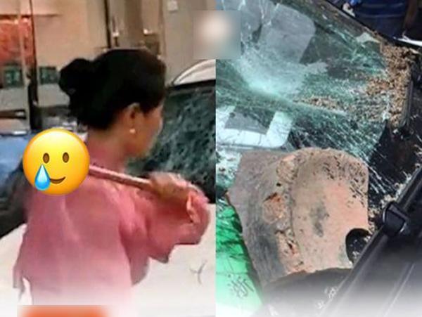 Chỉ vì bạn trai đến trễ, cô gái điên tiết dùng búa đập hỏng nhiều xế sang-1