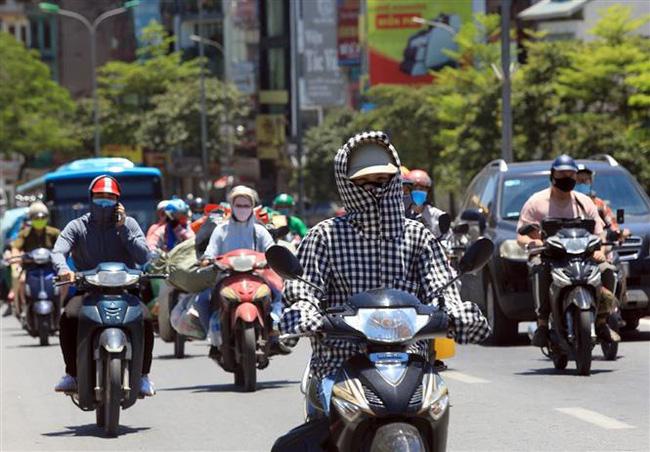 Chấm dứt chuỗi ngày mưa mát mẻ, Bắc Bộ đón nắng nóng trở lại-1