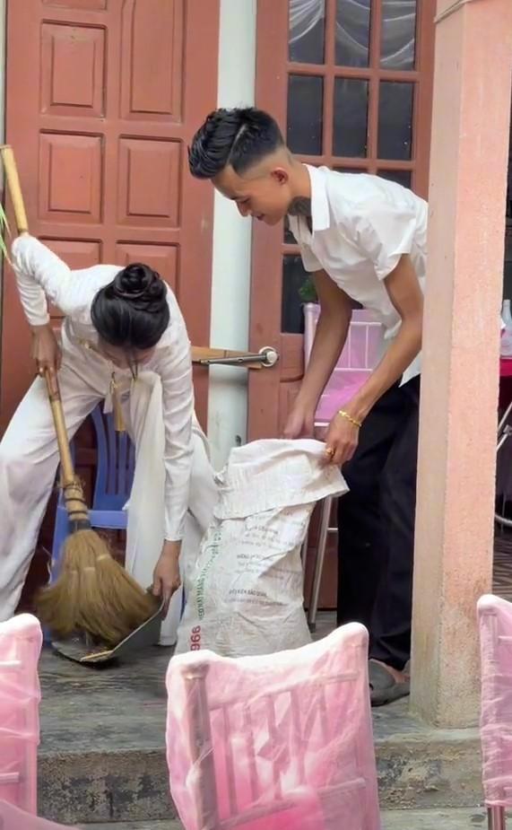 Mới về nhà chồng, nàng dâu gây bão xắn quần dọn rác đám cưới-2