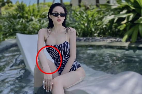 Tâm Tít chỉnh ảnh bikini 'ảo lòi' làm biến dạng cả chân tay