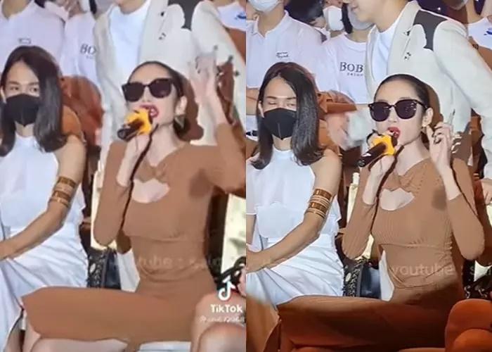 Người đẹp chuyển giới diện chiếc đầm body màu nâu tôn vóc dáng cùng điểm nhấn là chi tiết khoét vòng 1 gợi cảm.