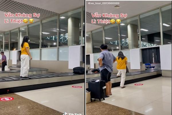 Xác định danh tính nữ hành khách đứng lên băng chuyền hành lý-2