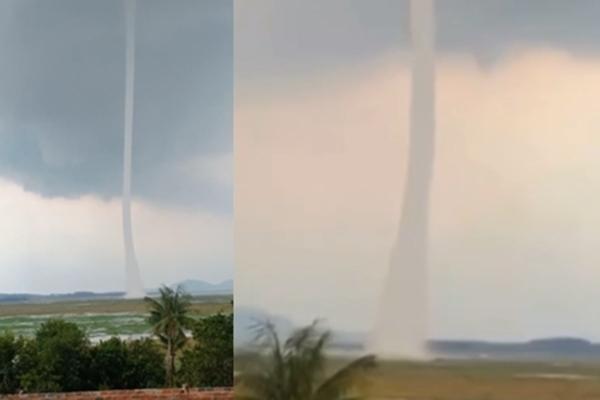 Clip: Xuất hiện vòi rồng cắm thẳng đứng xuống hồ Trị An-1