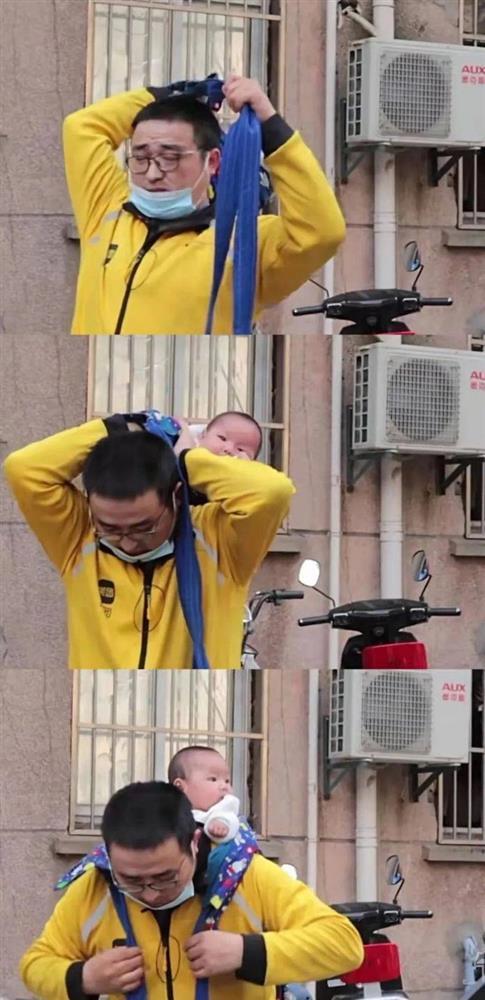 Xót xa trước hoàn cảnh ông bố địu con chưa đầy 1 tuổi đi giao hàng-1