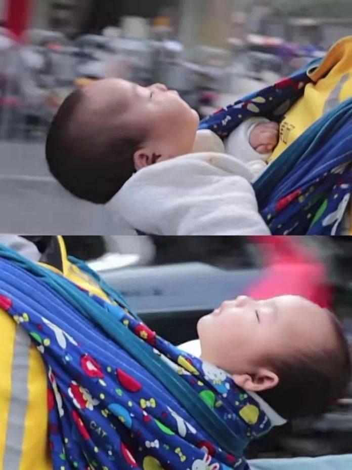 Xót xa trước hoàn cảnh ông bố địu con chưa đầy 1 tuổi đi giao hàng-2