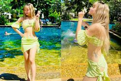 Diện bikini vóc dáng quá nuột, vợ Mạc Văn Khoa bị nghi sống ảo