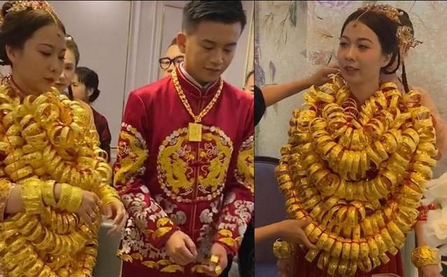 Cô dâu đeo vàng kín cổ trong đám cưới, hồi môn chất đầy vali-1