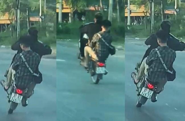 Clip: 2 thanh niên ngang nhiên bốc đầu, đánh võng trên Quốc lộ-1