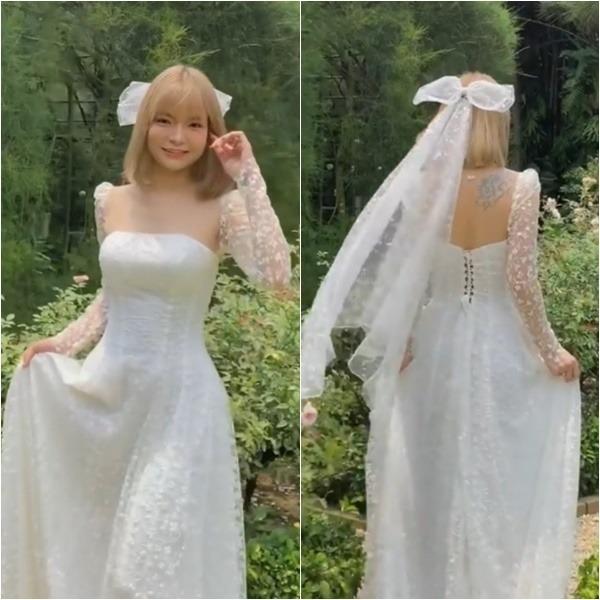 Các cô dâu Vbiz khoe hình xăm độc lạ khi mặc váy cưới-7