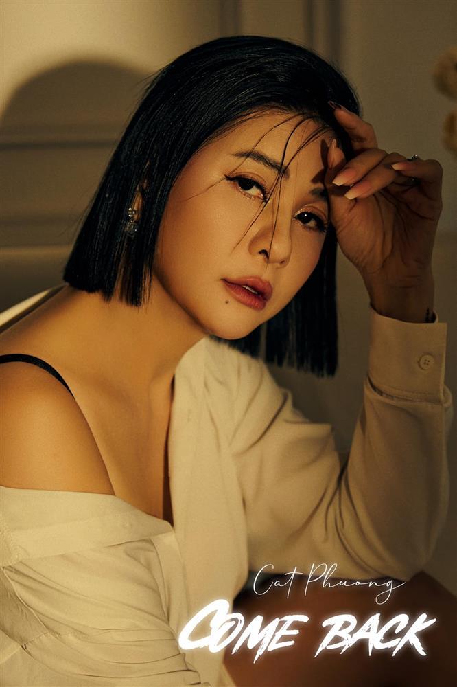 Cát Phượng giữ hình xăm Kiều Minh Tuấn trong bộ ảnh comeback-1