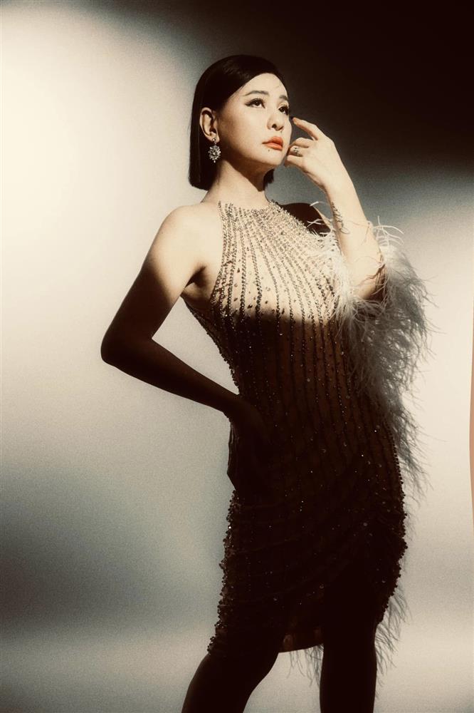 Cát Phượng giữ hình xăm Kiều Minh Tuấn trong bộ ảnh comeback-12