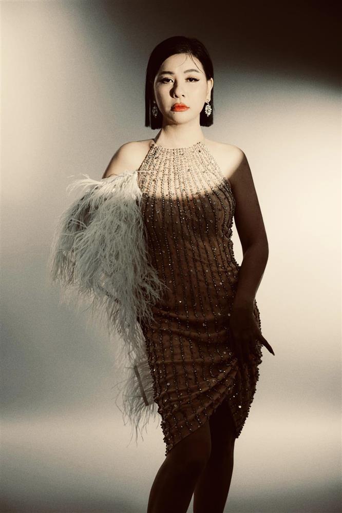 Cát Phượng giữ hình xăm Kiều Minh Tuấn trong bộ ảnh comeback-13