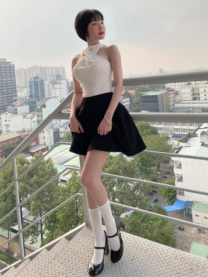 Elly Trần đấu giá váy mặc khi đi ký đơn ly hôn-4
