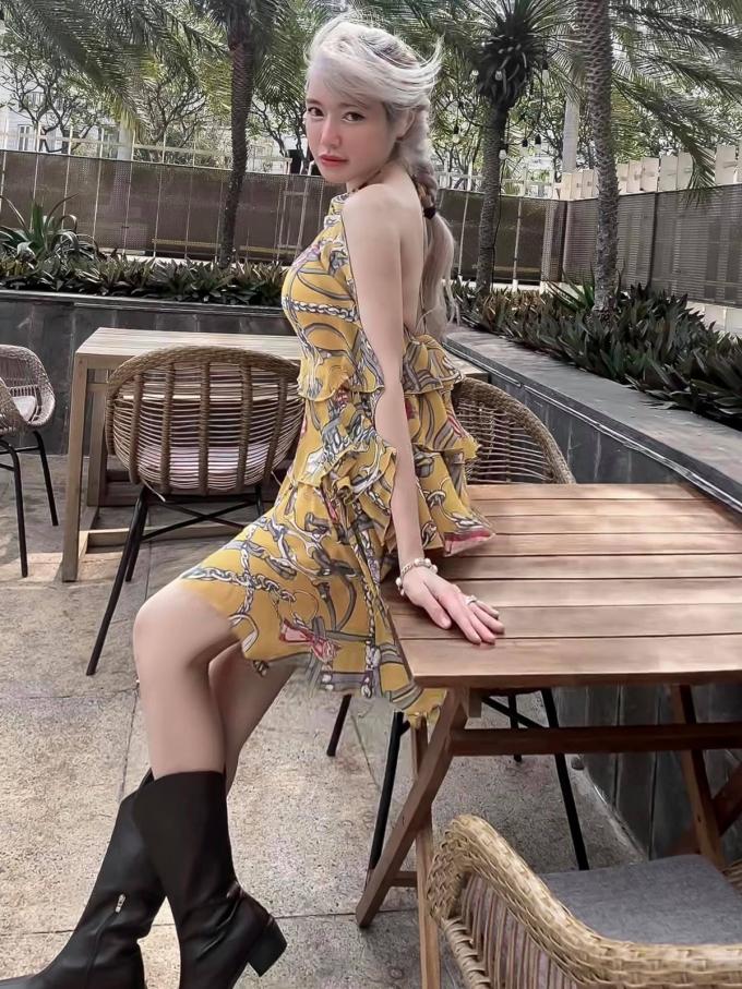 Elly Trần đấu giá váy mặc khi đi ký đơn ly hôn-5