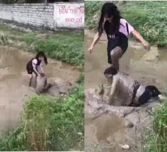 Clip: Nữ sinh bị bạn đấm đá dã man, lôi cổ nhấn xuống bùn-2