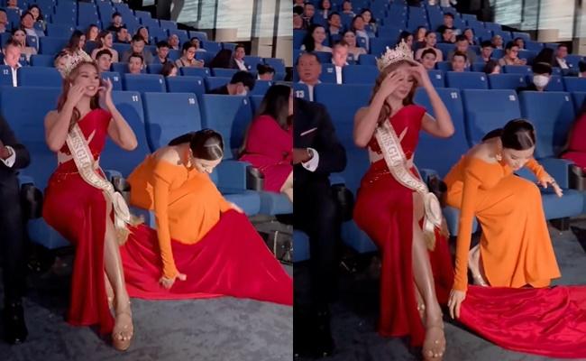Vũ Thu Phương khom người chỉnh váy cho Miss Global 2022 giữa sự kiện-4