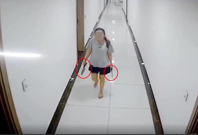 Đưa người phụ nữ cầm dao dọa hàng xóm vào viện tâm thần điều trị-2