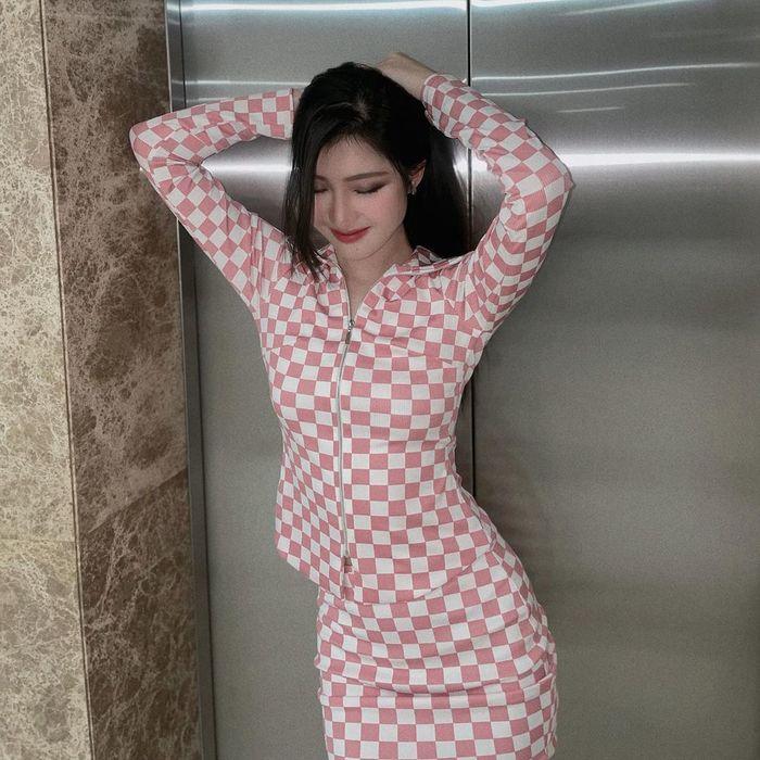 Hoa hậu Thanh Thủy mặc lại đầm gió rét của Lương Thùy Linh-7
