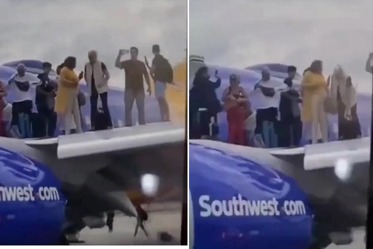 Sơ tán khẩn cấp, khách vẫn thản nhiên ôm vali leo lên cánh máy bay selfie-1