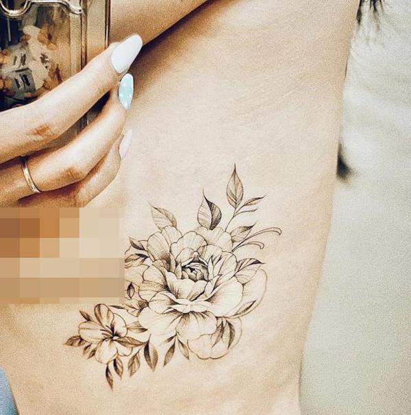 Vừa mang thai lần 3, MC Hoàng Linh khoe hình xăm mới sát vòng 1-1