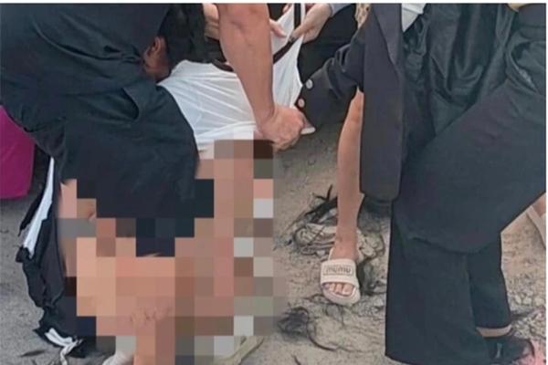 Công an truy bắt nhóm người lột đồ, cắt tóc cô gái giữa đường-2