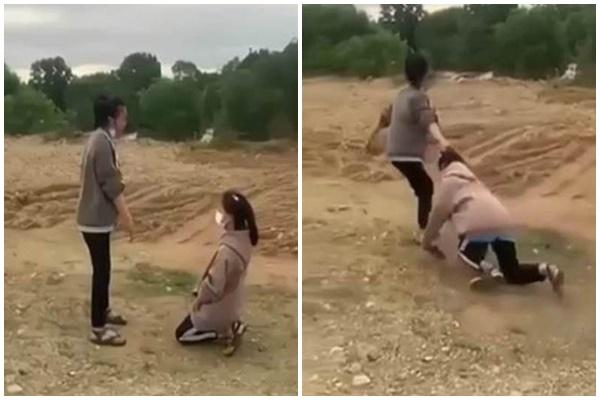 Nữ sinh bị đè xuống đất, tát liên tiếp vào mặt ở bãi đất trống-1
