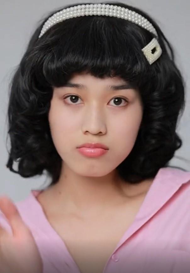 Đỗ Thị Hà gây sốc với kiểu tóc độc lạ chưa từng thấy-2