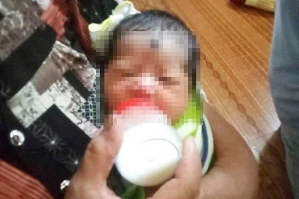 Phát hiện bé trai khoảng 10 ngày tuổi bị bỏ rơi trước cổng chùa-2