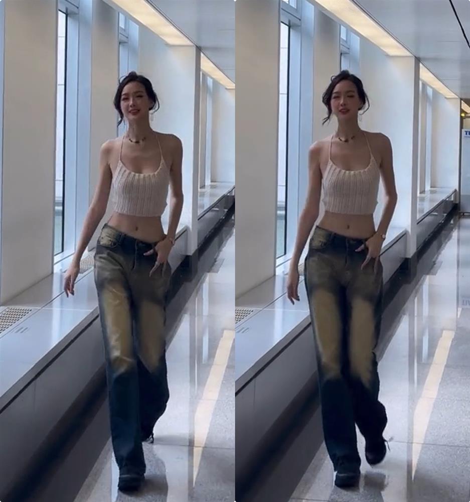 Con gái bác sĩ khoa sản cao gần 1m90, diện áo hở trọn tấm lưng, hơn 2,3 triệu người vào xem-1