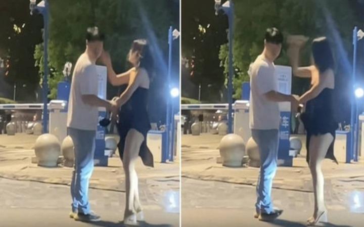 Chàng trai bị bạn gái tát 19 cái trên phố vẫn kiên trì nắm tay cô không buông-1