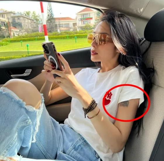 Cách Á hậu Hồng Hạnh che khéo 2 hình xăm ở cánh tay-2