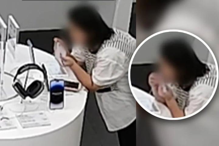Người phụ nữ dùng răng cắn đứt cáp chống trộm, ăn cắp iPhone 14-1
