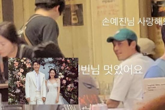 Mặc đồ đôi đi ăn cùng vợ sau 4 ngày xa cách, biểu cảm của Hyun Bin gây chú ý