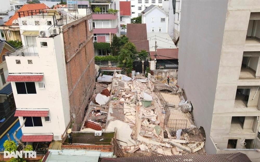 Vụ sập nhà 4 tầng ở TPHCM: Căn nhà kế bên đang bị nghiêng-1