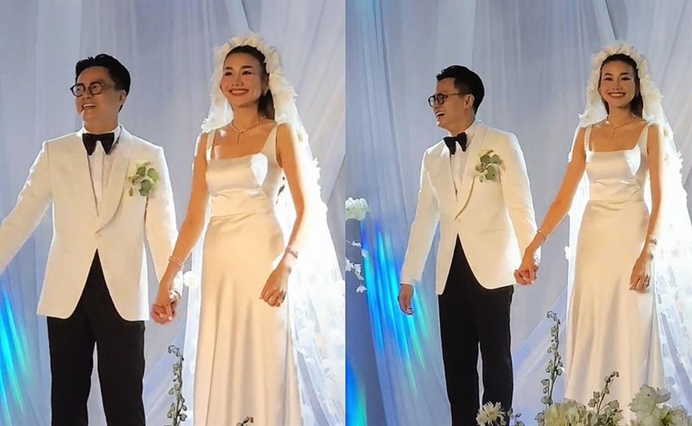 Khoảnh khắc chồng nhạc trưởng hôn Thanh Hằng trong lễ cưới xa hoa gây sốt-1