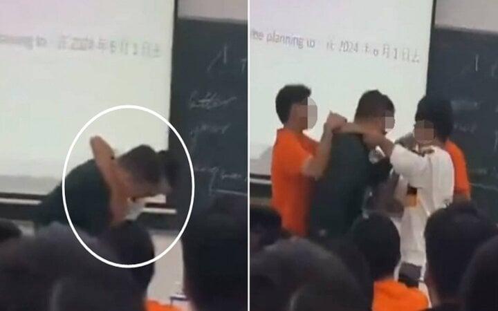Tịch thu điện thoại của học sinh, giáo viên bị đánh ngay trên bục giảng-1