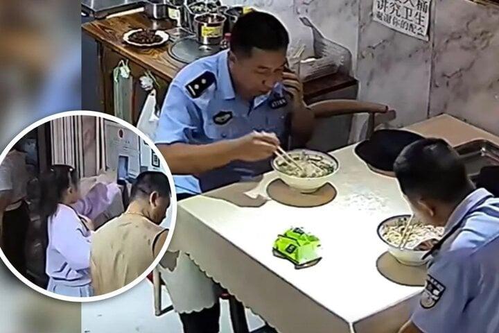 Bé gái 10 tuổi bí mật trả tiền ăn cho hai cảnh sát trong nhà hàng gây sốt mạng-1