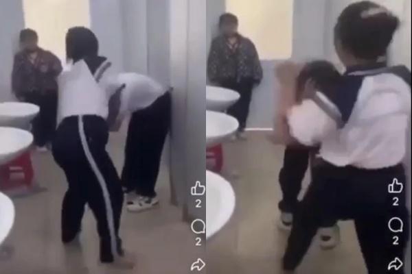 Lại xuất hiện clip nữ sinh bị nhóm bạn đánh túi bụi trong nhà vệ sinh trường học-1
