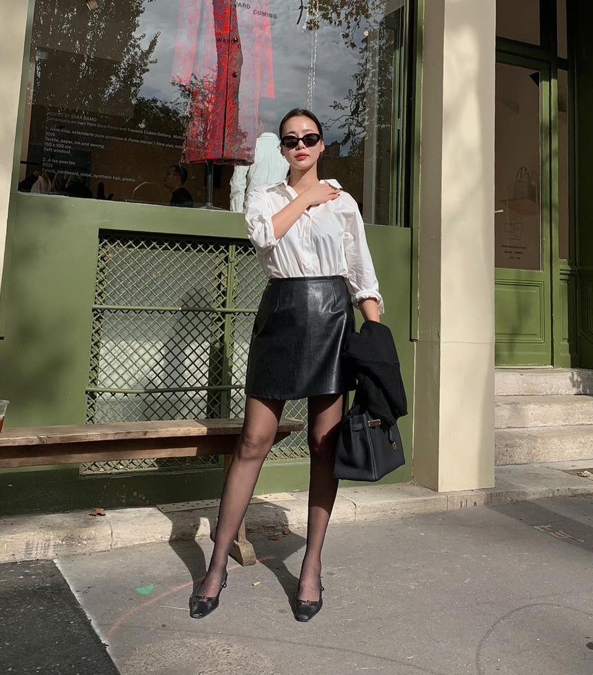 Học sao Hàn diện quần tất đen để chân thon thả, phong cách thêm sang trọng-9