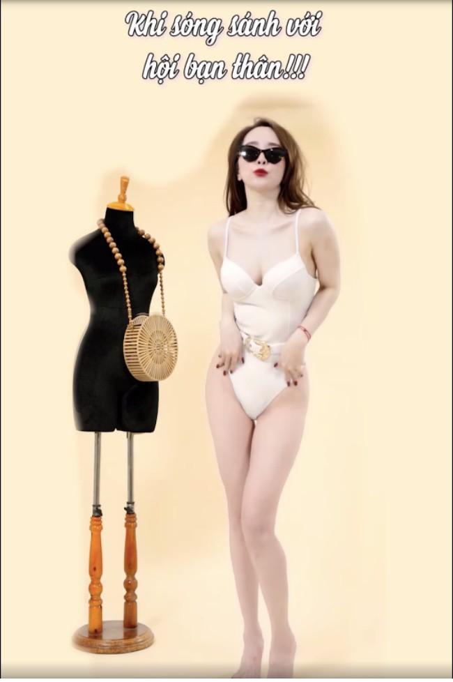 Chẳng cần bikini, Quỳnh Nga vẫn gợi cảm vô ngần với quần short, áo quây đi biển-4