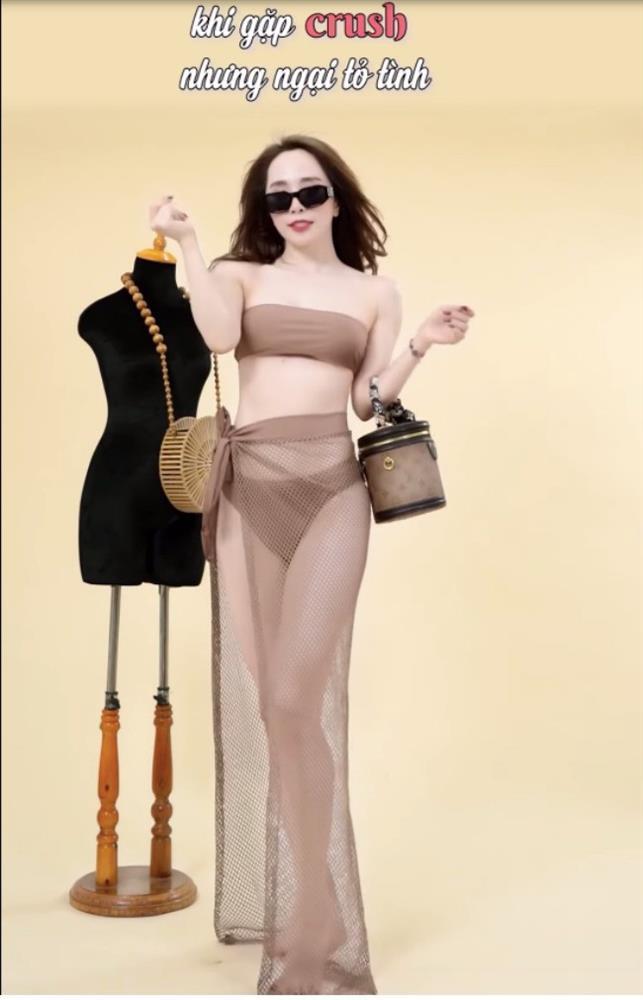 Chẳng cần bikini, Quỳnh Nga vẫn gợi cảm vô ngần với quần short, áo quây đi biển-5