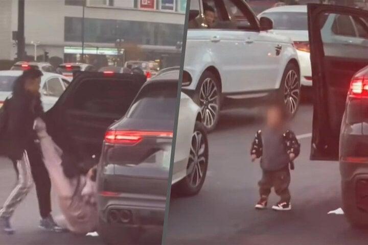 Mặc kệ con nhỏ ngã trên đường đầy xe cộ, chồng nổi điên cố lôi vợ ra khỏi ô tô-1