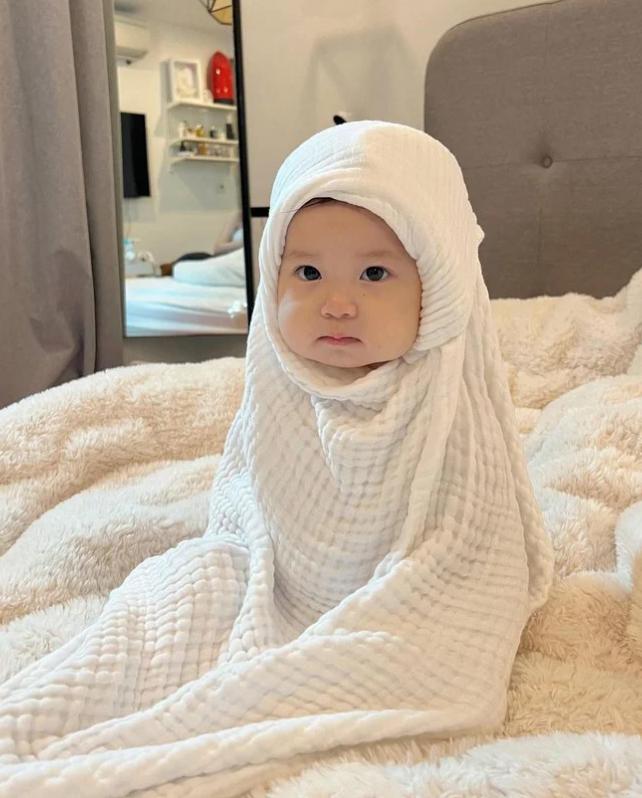 Cháu gái của chủ tịch tập đoàn may mặc - Pam yêu ơi gây chú ý với bộ ảnh chụp áo dài Tết-5