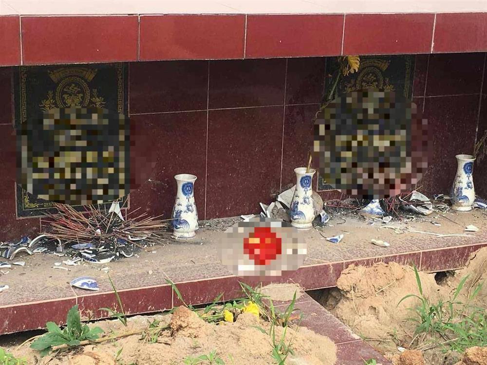 Truy tìm kẻ xấu phá hoại hàng loạt ngôi mộ ở Hà Nội-2