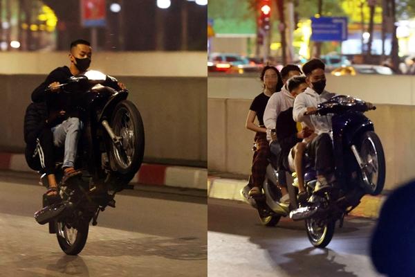 Chạy xe máy bốc đầu trên phố, nhóm thanh niên còn livestream khoe thành tích-2