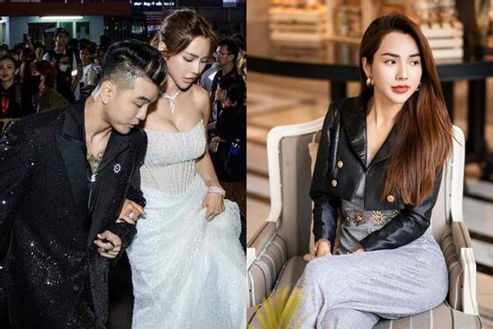 Vợ Ưng Hoàng Phúc ngày thường kín kẽ, đi với chồng lại thích váy hở táo bạo