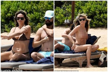 Heidi Klum cởi bikini để tắm nắng gây tranh cãi