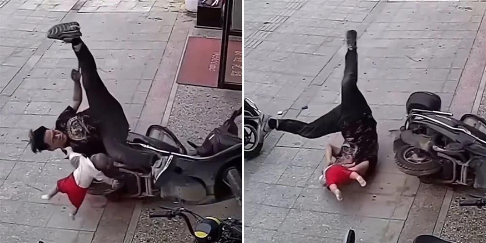 Người đàn ông xoay mình, lộn nhào nhanh như chớp để cứu con-1