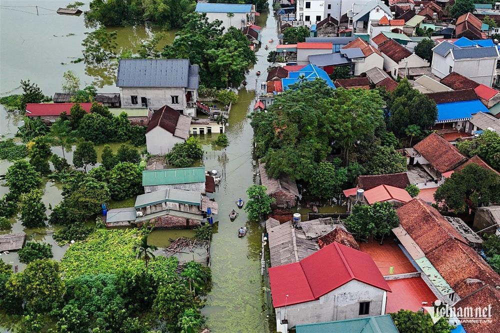 Hàng nghìn hộ dân ở Hà Nội vẫn bị cô lập sau 1 tuần nước tràn đê sông Bùi-1