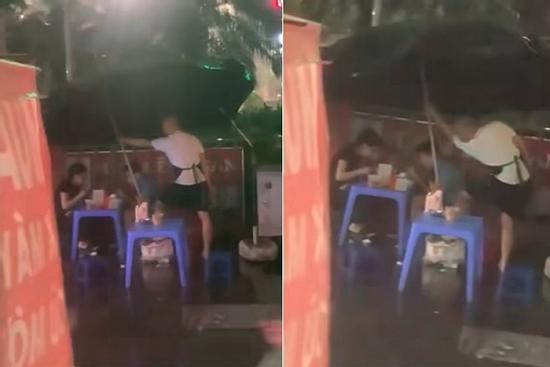Clip thanh niên che ô cho khách ngồi ăn giữa trời mưa 'gây bão' mạng
